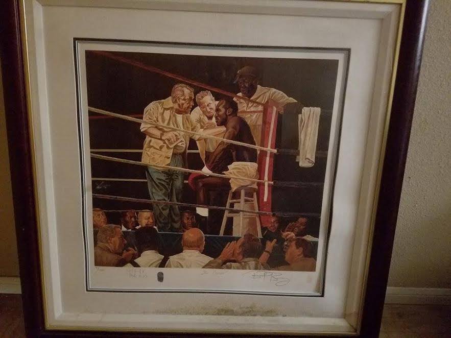 EVANDER HOLYFIELD FRAMED LITHOGRAPH MEASURING 38.7 X 26.7