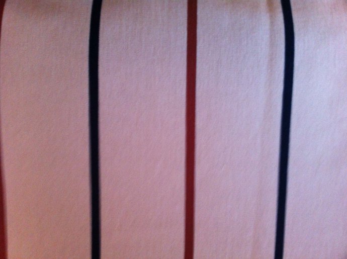 70" wide 35". Light Brown Knit with Lines