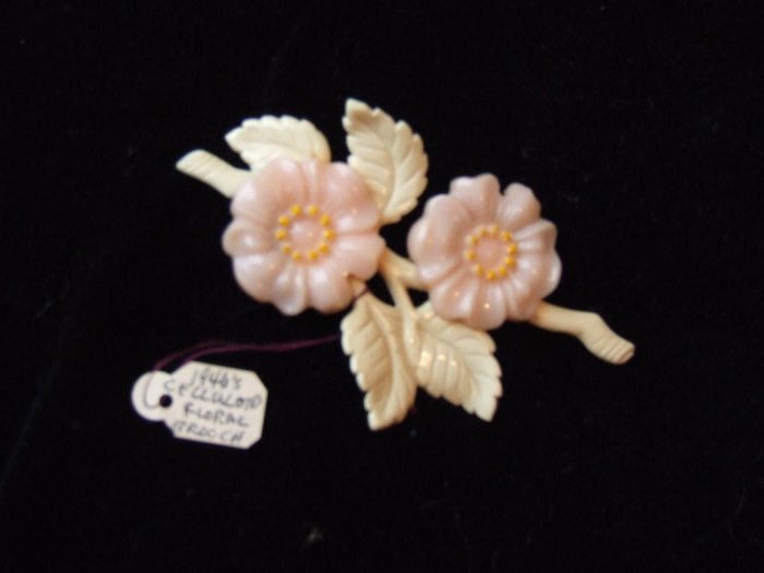 Pin Celluloid floral brooch