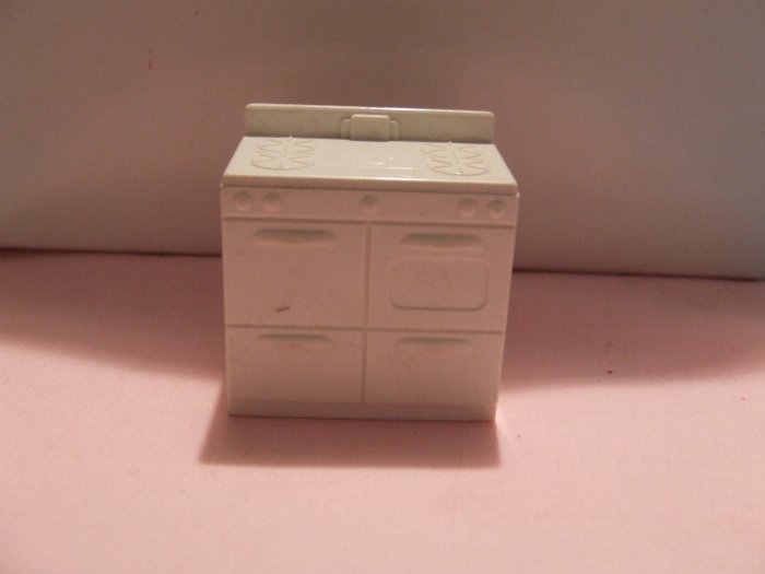 Dollhouse Furniture Molded white plastic kitchen stove marked MARX