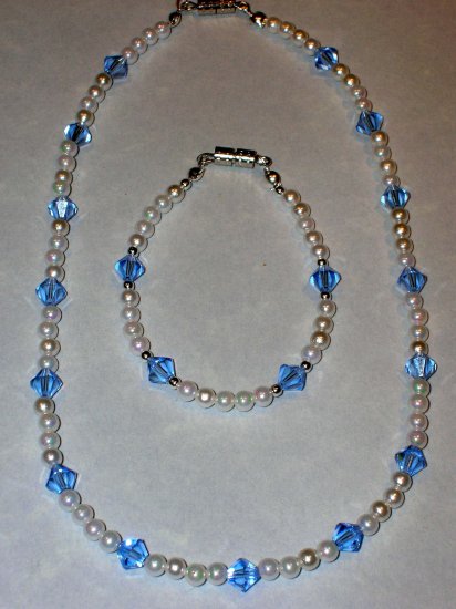 Child's necklace & bracelet set pearls & lt. blue swarovski