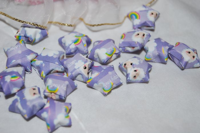 Lamb and rainbow patterned purple stars
