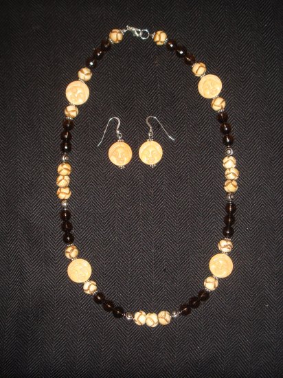 Faceted Smokey Quartz.. with bone beads