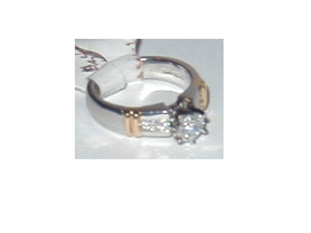 Platinum and Gold Diamond Ring