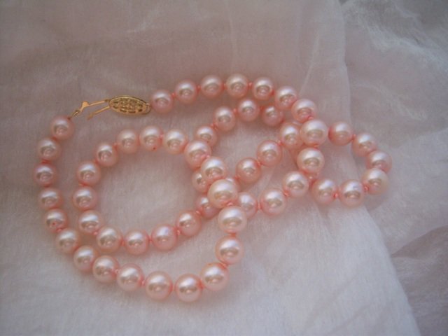 Genuine Freshwater Cultured Pink Pearl Strand Necklace with 14k Gold Clasp. MSRP: $249.00.