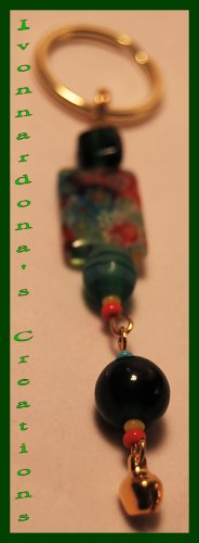 Green Flowers And A Gold Bell