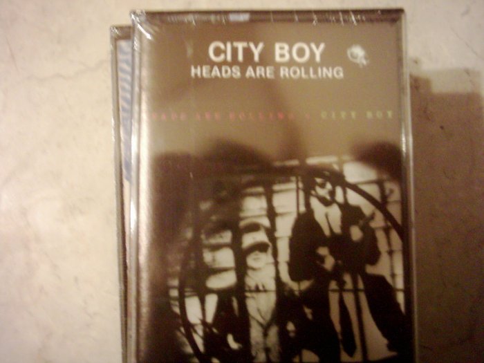 city boy=heads are rolling