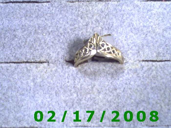 Sterling Ring size 7 diamond cut shaped like crown