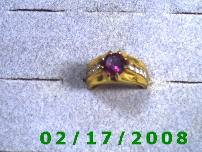 Gold platedRing size 7 China w/ruby and 8 clear stones
