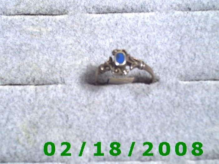 .925 Silver Ring size 6 w/blue stone