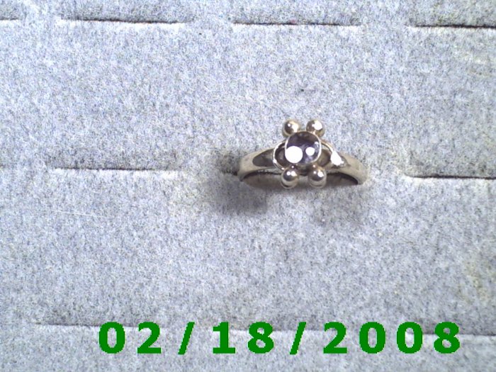.925 Silver Ring size 7 w/light purple stone