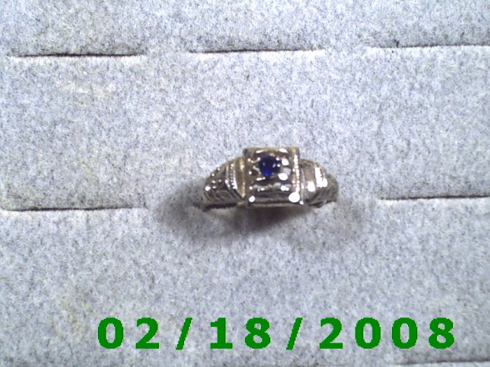 Silver Ring size 7 w/small blue stone