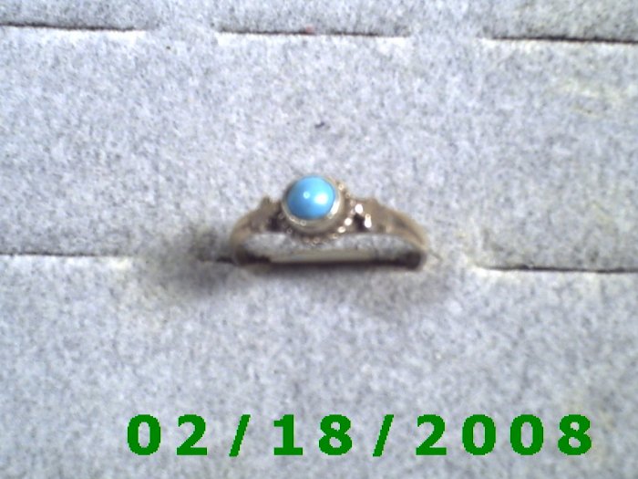 .925 Silver Ring size 9 w/light blue stone