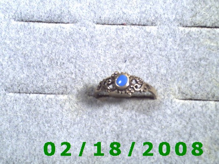 .925 Silver Ring size 9 w/light blue stone