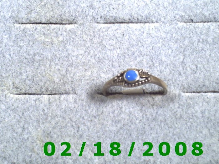 .925 Silver Ring size 9 w/light blue stone