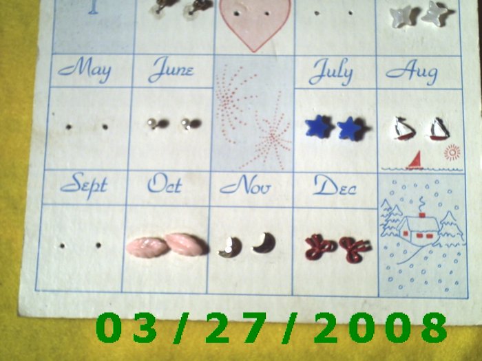 Card with 8 pair of childs pierced earrings (008)