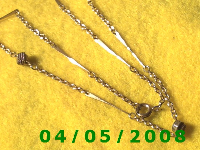 Gold Necklace w/knots and bars E5012
