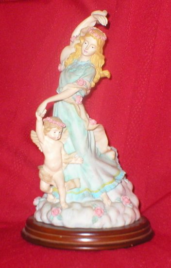 Angel Dancing with a Cherub
