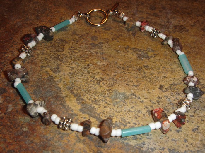 Leopardskin jasper bracelet with turqouise-colored accents