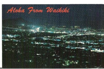 Aloha From Waikiki Nighttime Aerial View 1960s Postcard in Color Unused