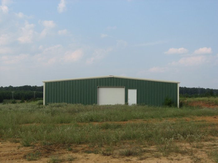 40' x 60' x 12' 1:12 roof slope 1) 10' x 10' F/O Centered Each End Wall.