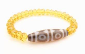 The Golden Tiger Tooth 6 Eyed DZi Bead with 8mm Faceted Citrine Bracelet
