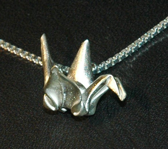 Silver Origami Crane Pendant on a Venetian Box style necklace
