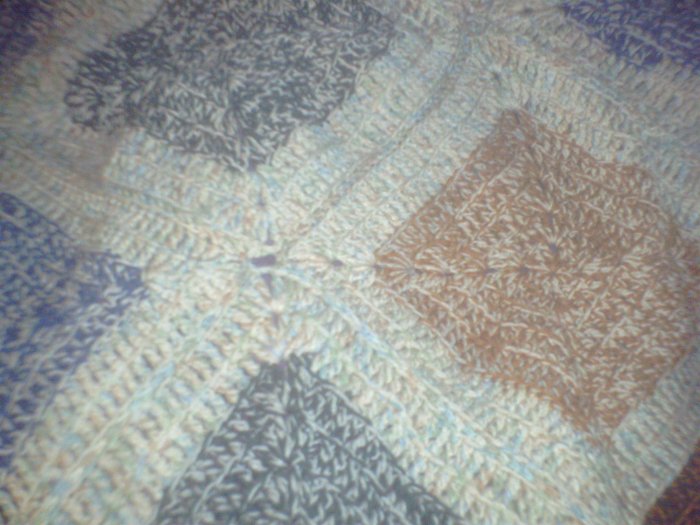 Brown, blue, green and tan throw