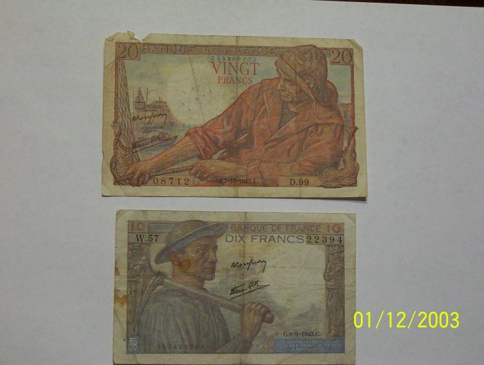 20 & 10 Franc bills.