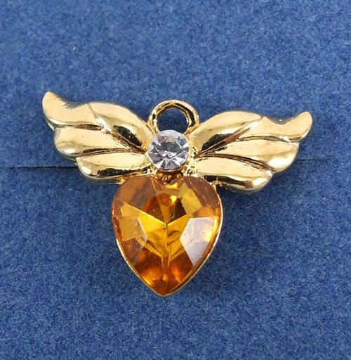 Tiny Angel Birth Stone Pin by Avon from the 2000s November
