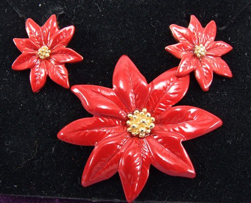 Red Poinsettia Clip Earrings and Pin by Avon from the 1990s