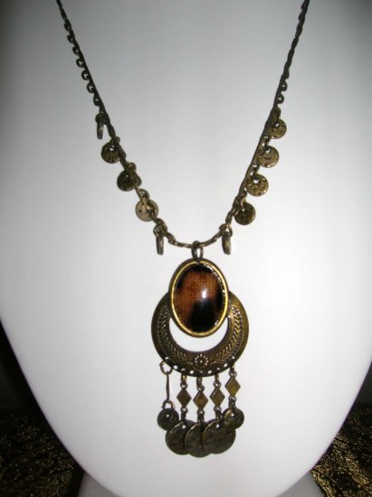 Necklace with brown pendant