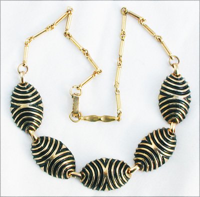 Vintage necklace gold tone metal with black enamel accents circa 1960s jewelry