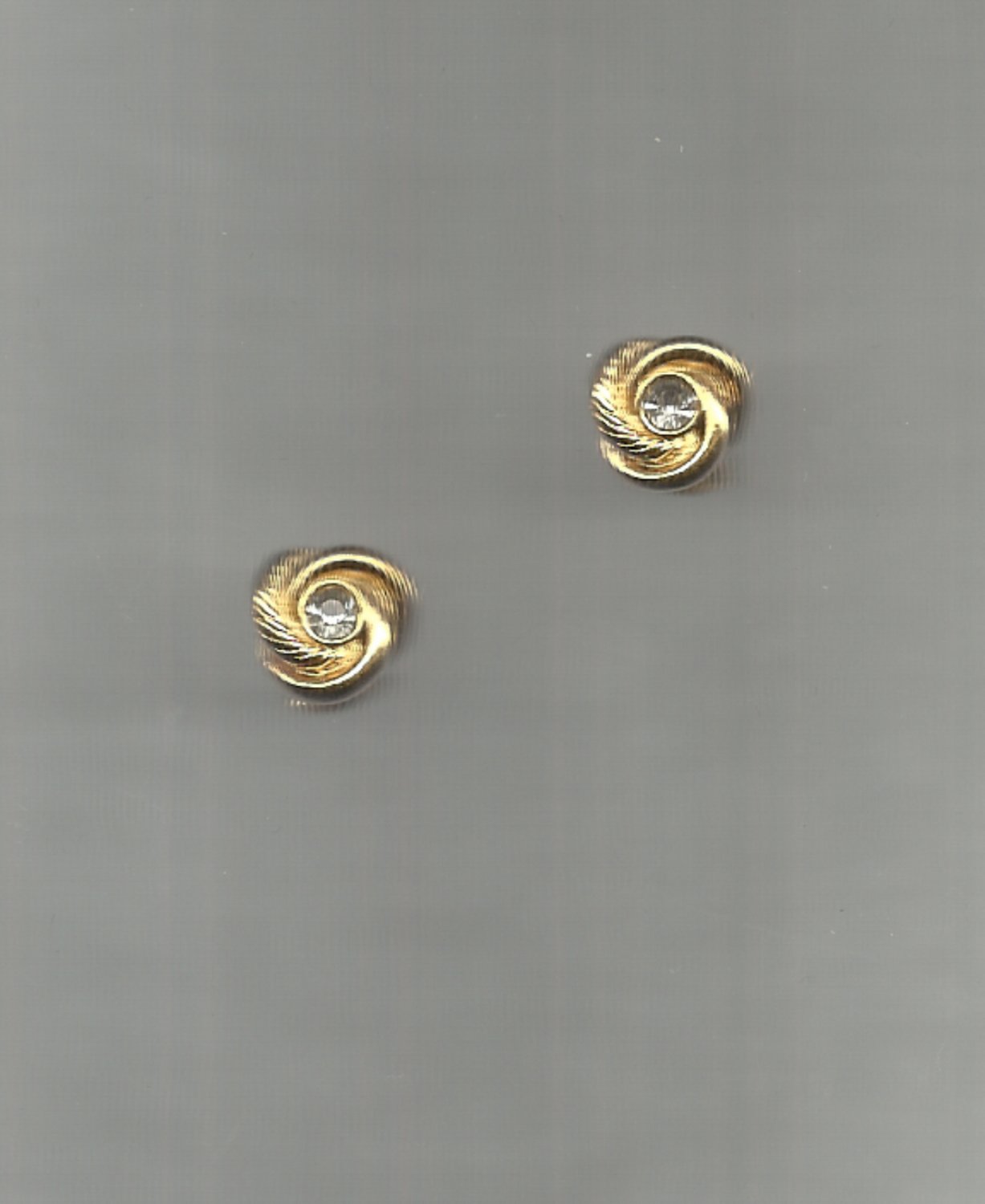 Avon Center Rhinestone Knot pierced earrings