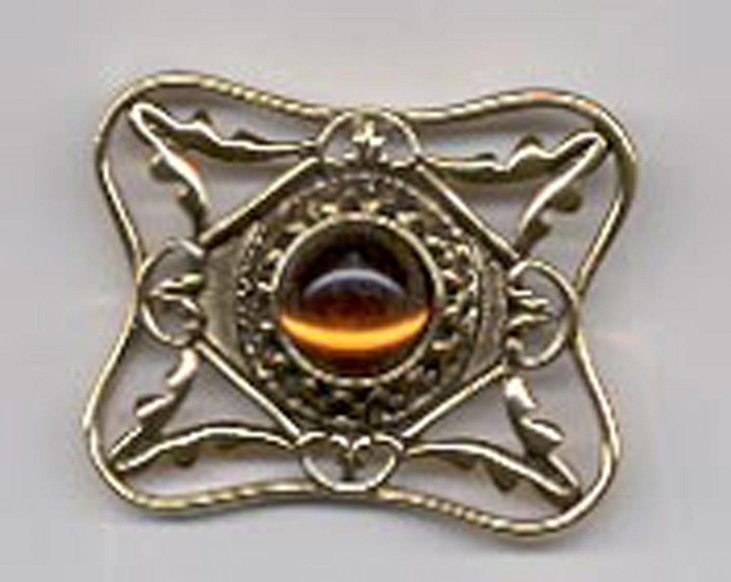 Avon Bold and Classic Pin- golden amberline