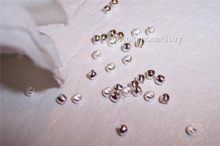CRIMP BEADS 2 mm SILVER PLATED q.100