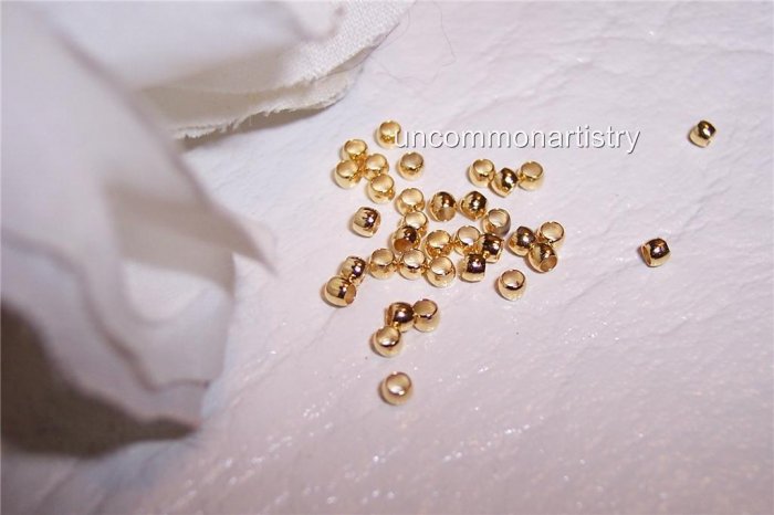 CRIMP BEADS 2 mm GOLD PLATED q.100