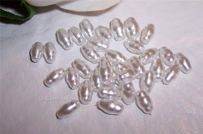 GLASS PEARLS Rice shaped WHITE 7X4 q.100