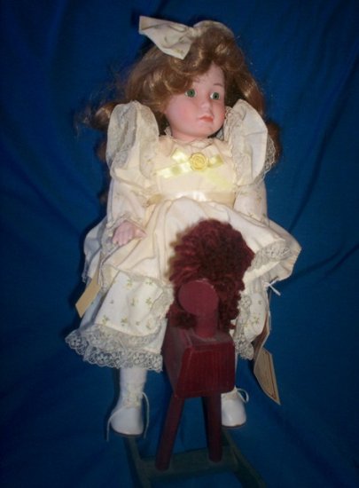 LYNETTE 14" MUSICAL DYNASTY DOLL WITH WOODEN HORSE