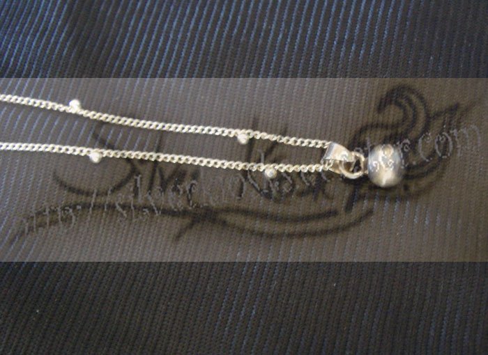 N012Necklace decorate with small caviar come with round pendant