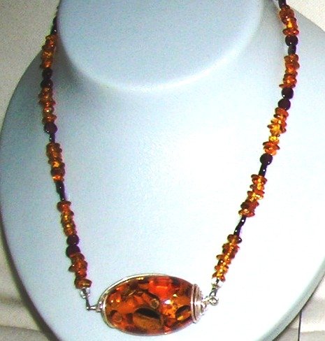 Amber necklace with garnet and pandent