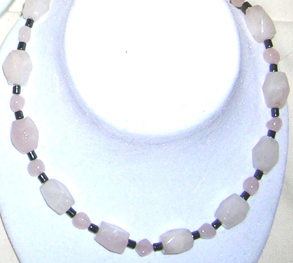 Rose quarts with black stone