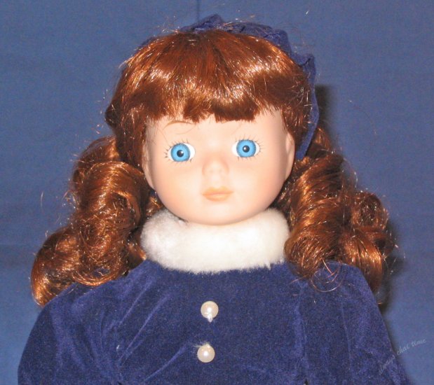 Victorian Girl porcelain doll 13in tall in blue winter dress