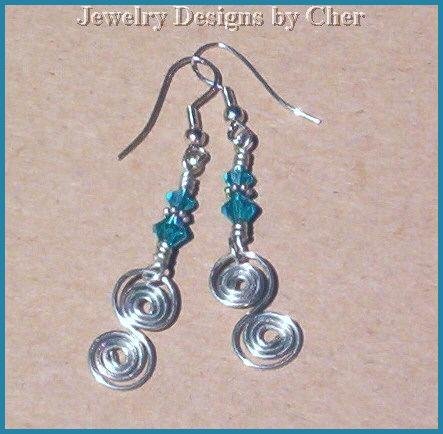 SWAROVSKI BLUE ZIRCON Silver Spiral Earrings