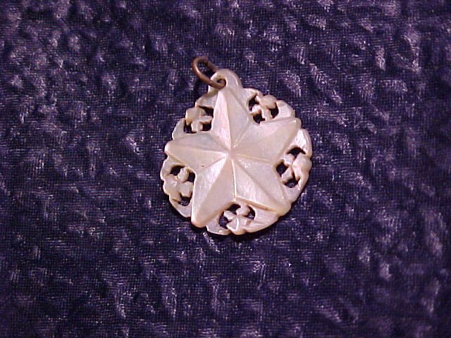 Hand Carved Mother of Pearl Star Finding