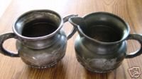 SUPERIOR QUADRUPLE SILVER PLATE CREAM AND SUGAR SET