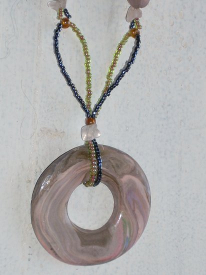 Swirls of Pink and Peuter with a touch of Green