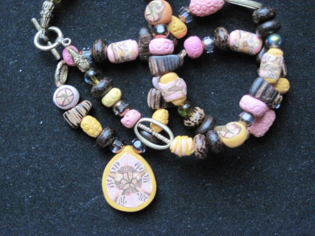 Pink and Yellow Kaleidoscopic medallion with exotic wood