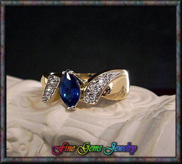 14KT Gold Plt Sapphire Blue Marquise Cut Cz ByPass Ring - SZ 7