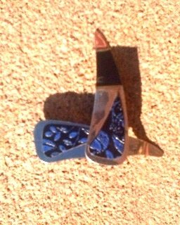 Black and blue leather flower stamped *Zaro 2 design dangle earrings